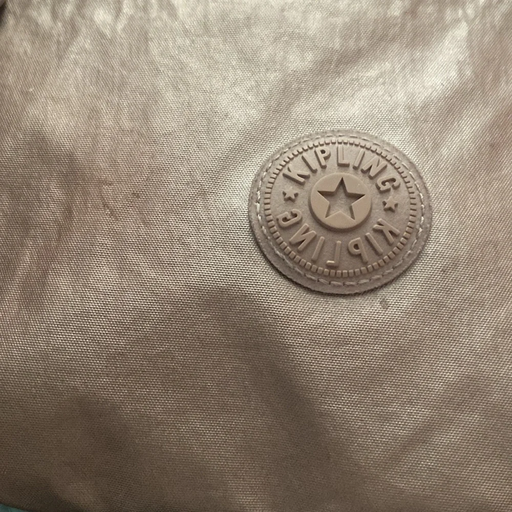 Rose Gold Kipling Pink Crossbody Bag with Signature Style